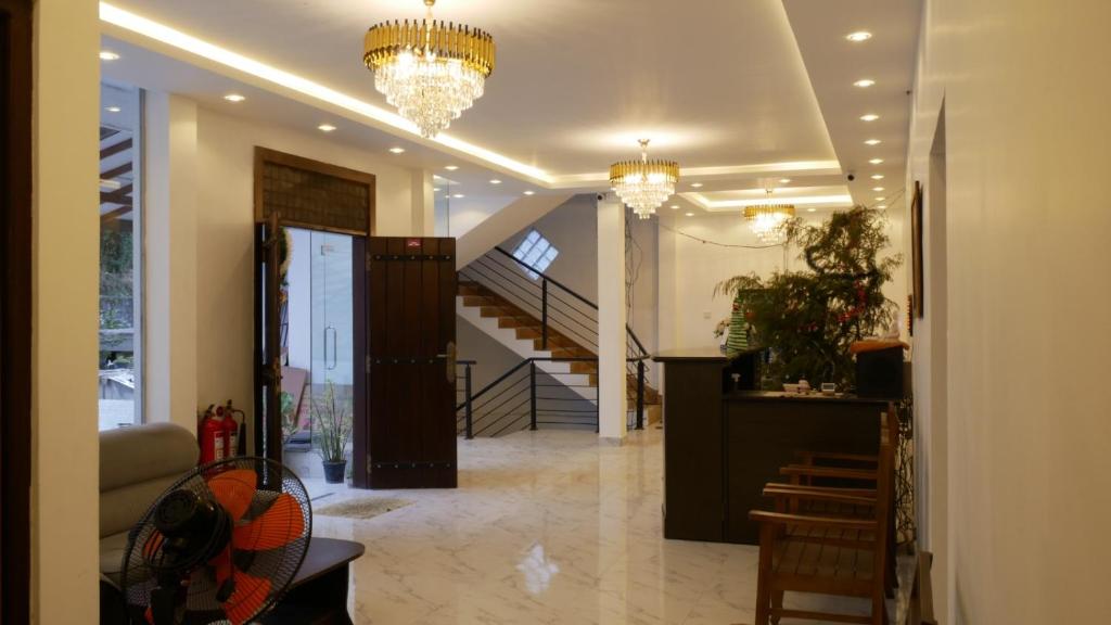 Grand arrival lounge and reception area at Nine Arch Holiday Resort Ella