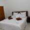 Deluxe Double Room with Balcony Photo 4